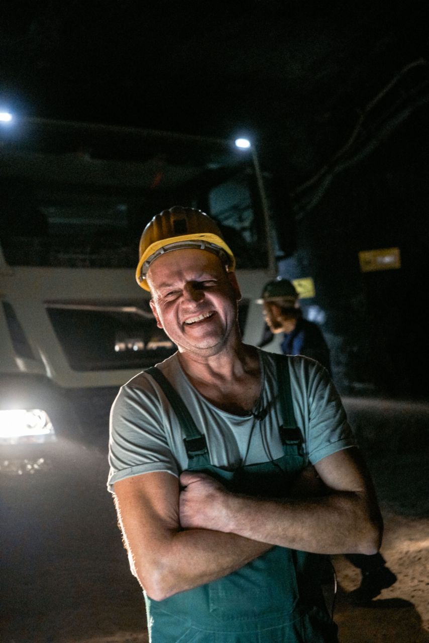 Underground trucker – Matthias Wenzel maneuvering the truck through a tunnel. Underground trucker – Matthias Wenzel maneuvering the truck through a tunnel.