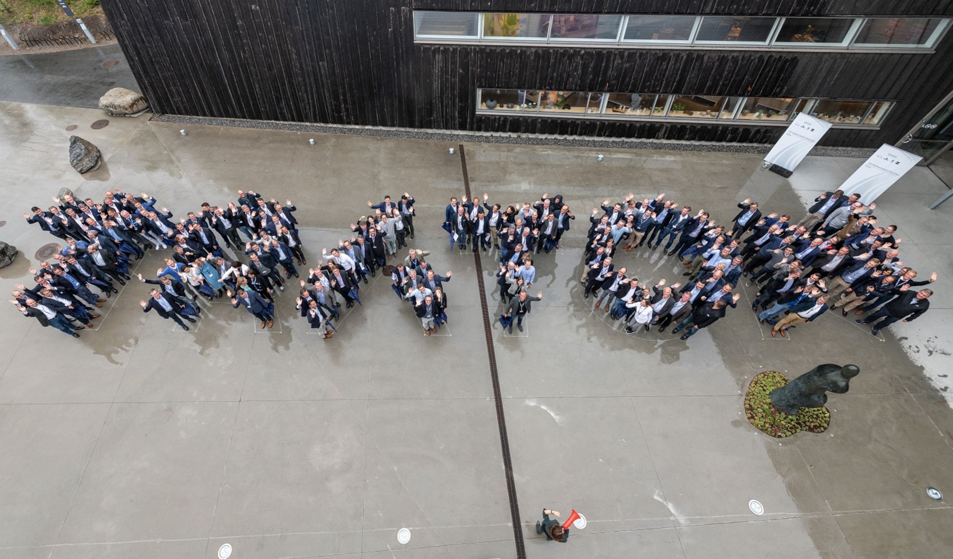 TRATON Logo Employees recreate TRATON logo.