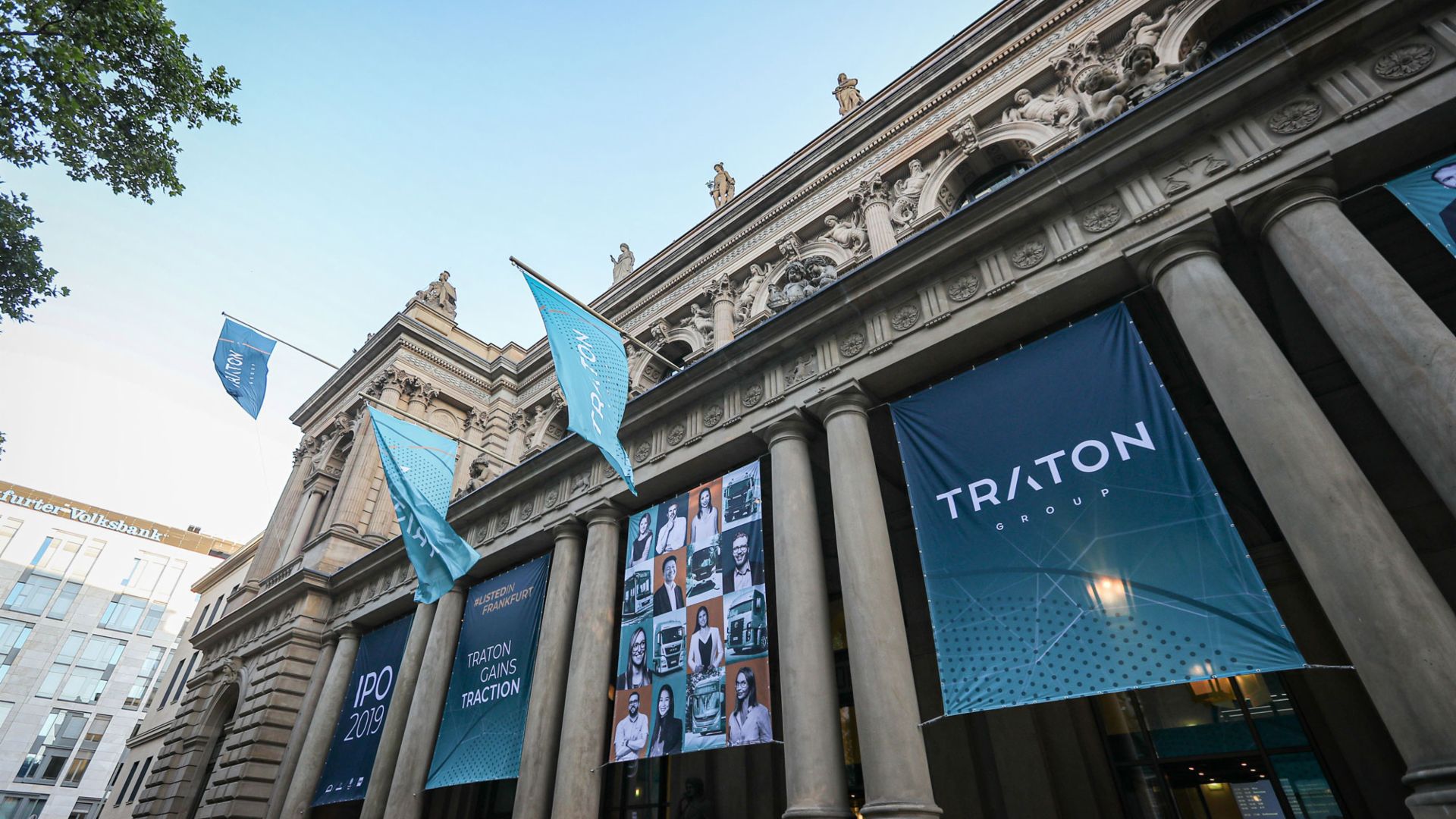 Blue TRATON banners hanging in front of the Frankfurt Stock Exchange