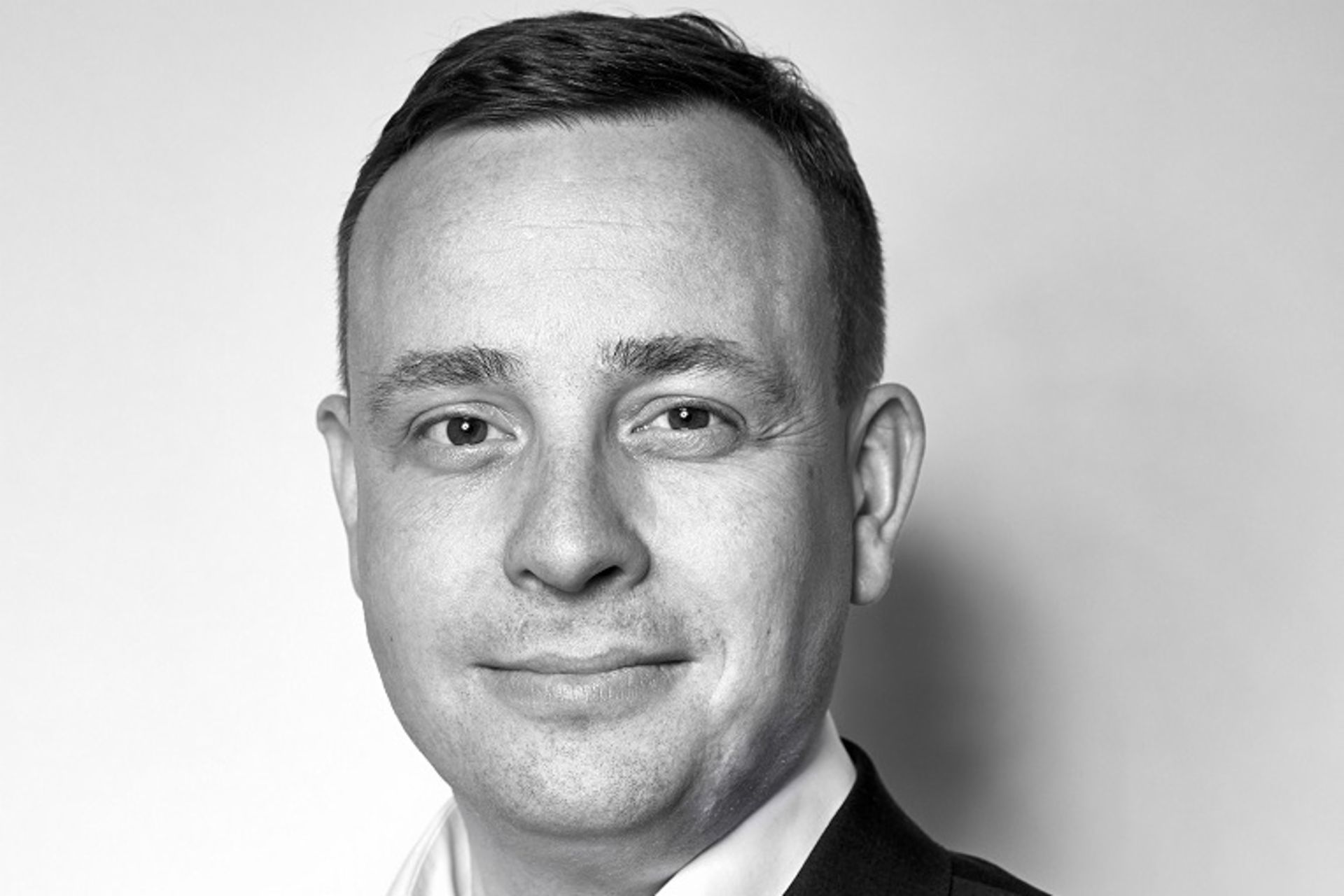 Christian Schulz, Member of the Executive Board of TRATON SE, responsible for Finance and Business Development balck and white portrait 3:2 of Christian Schulz, Member of the Executive Board of TRATON SE, responsible for Finance and Business Development