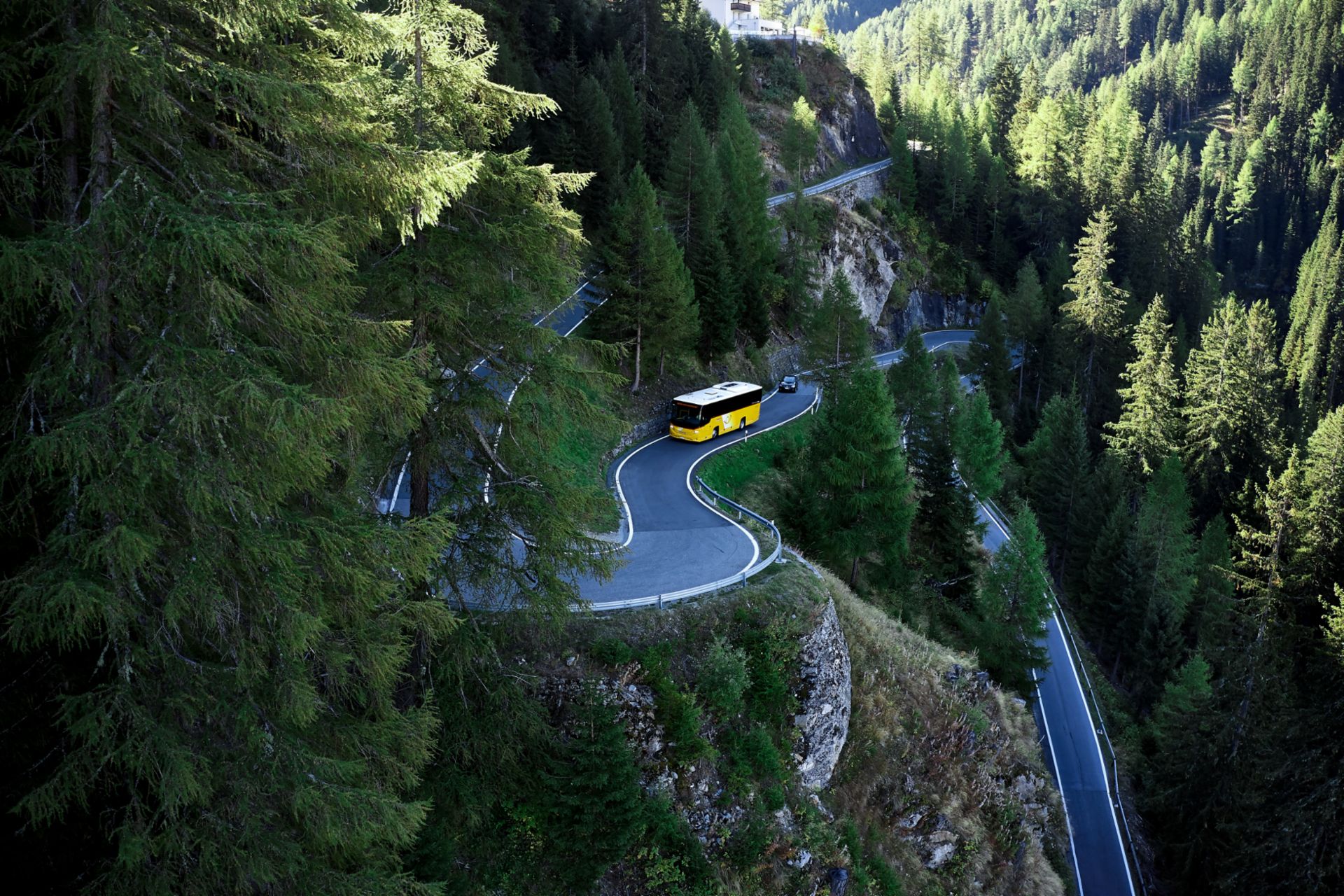 The bus route connects Val Müstair in Switzerland with the Valtellina region in northern Italy and is about 80 kilometers long.
