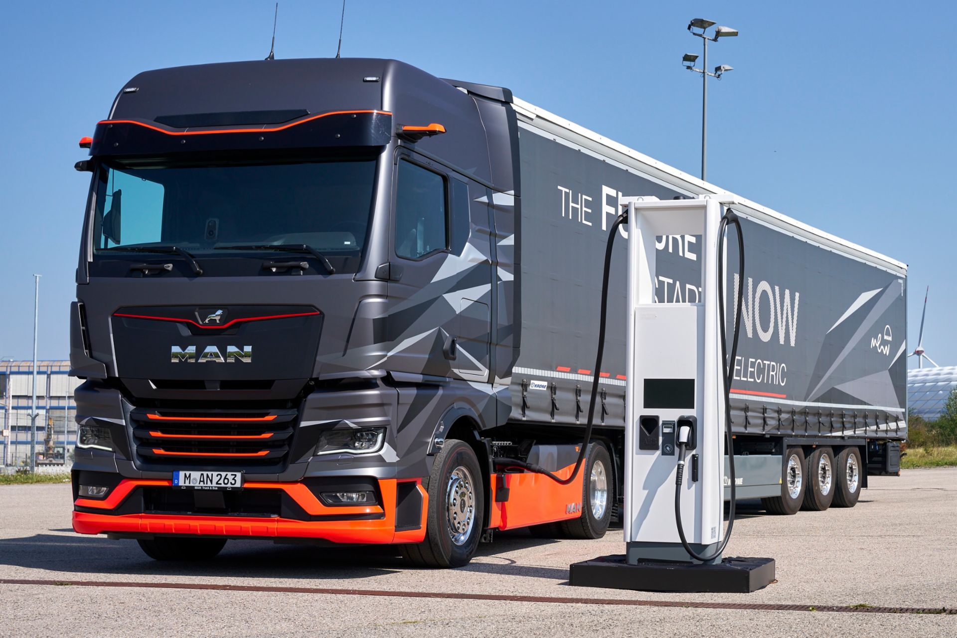 Big SCANIA truck at an e-charging-station
                     